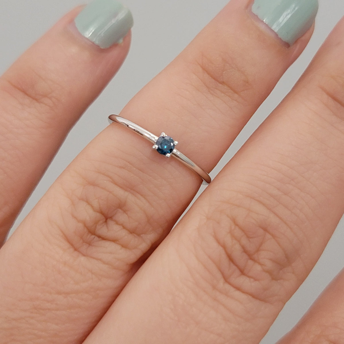 Blue Diamond Solitaire Ring