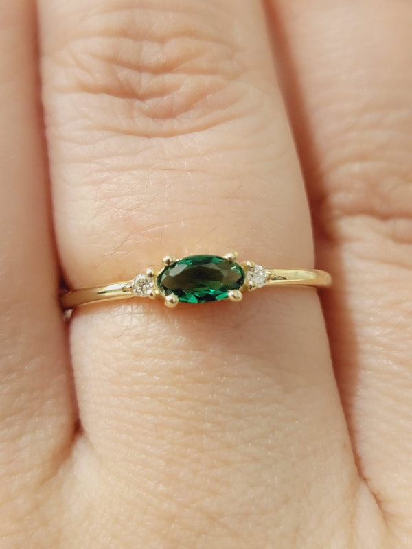 Oval Emerald Diamond Ring