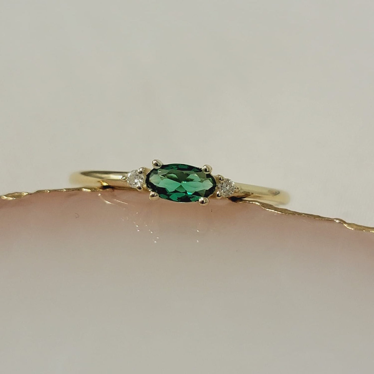 Oval Emerald Diamond Ring