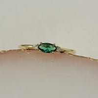 Oval Emerald Diamond Ring